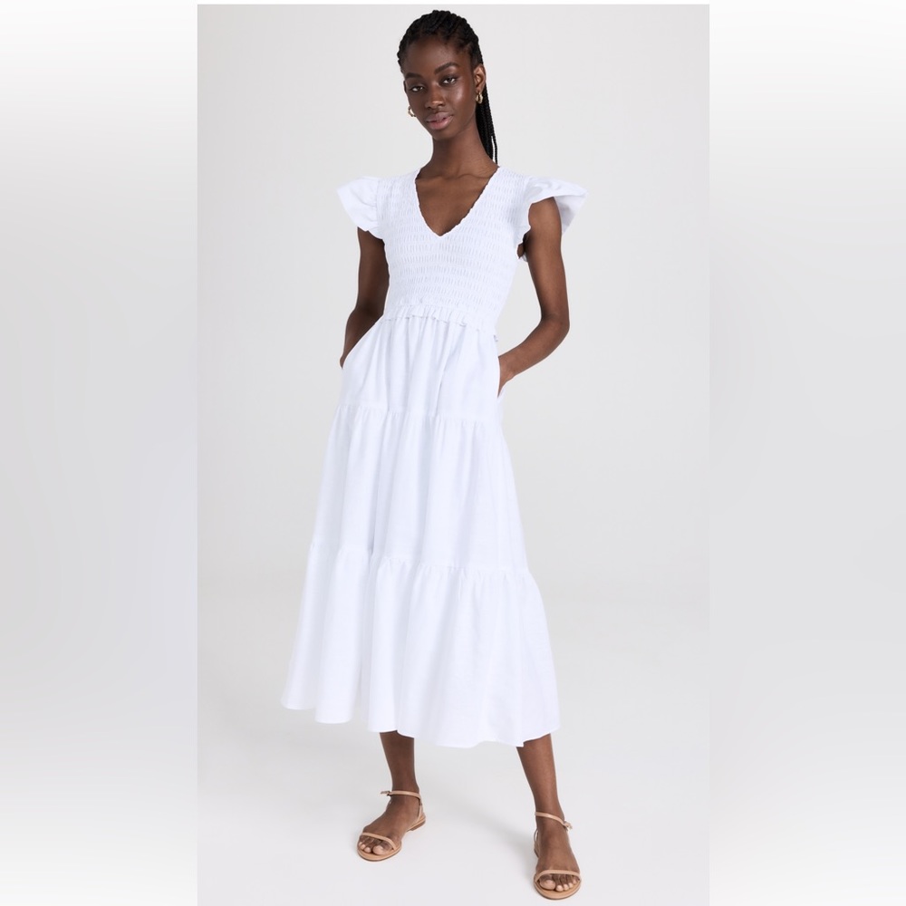 NWT o.p.t phoebe dress. Never been worn in perfect condition. Great for summer